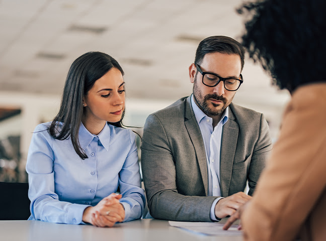 people talking to financial advisor