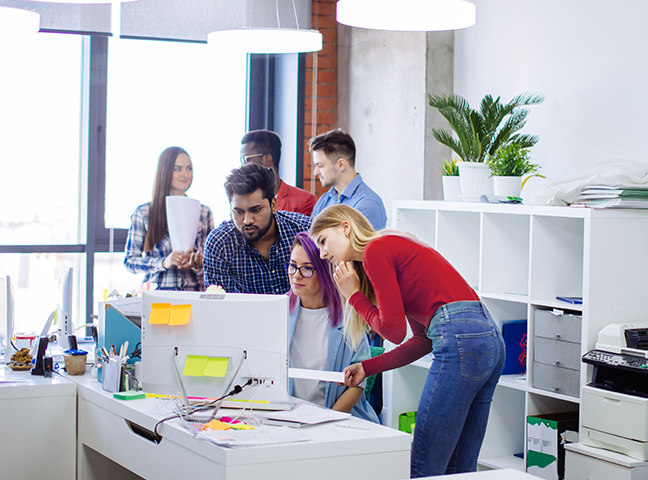 people working together in small office