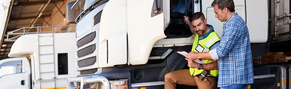 trucker looking at document