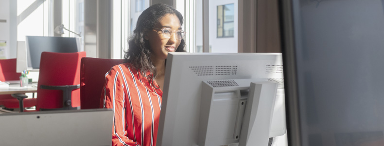 person on computer