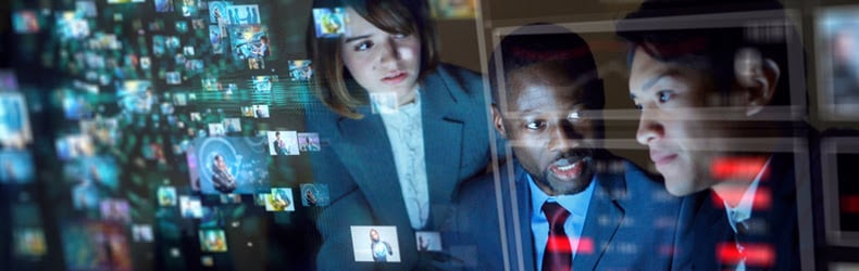 three people looking at security