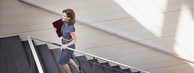 woman walking up stairs